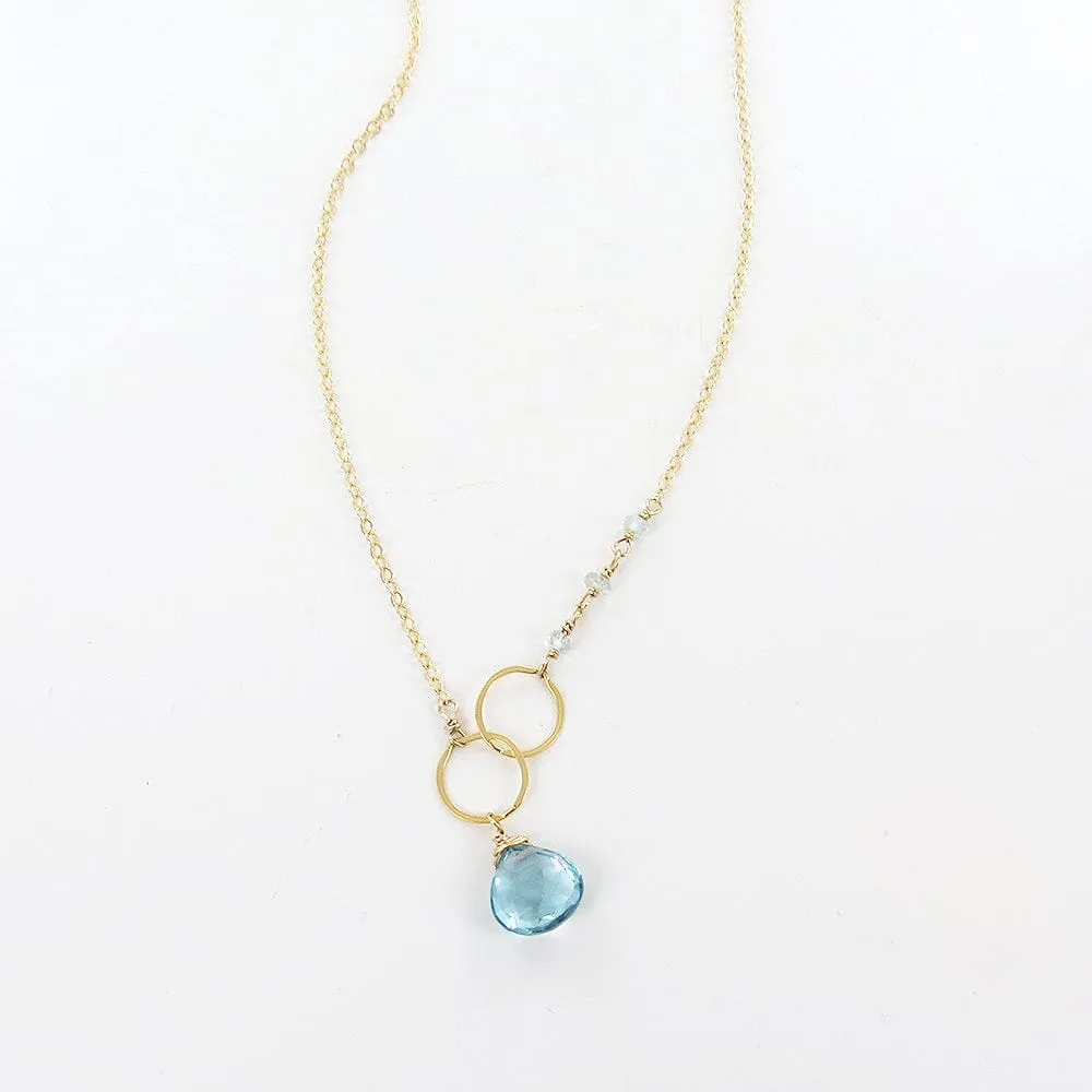 BLUE TOPAZ AND LOOPED GOLD NECKLACE